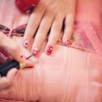 painting-fingernails-nail-polish-hearts-valentine-37553